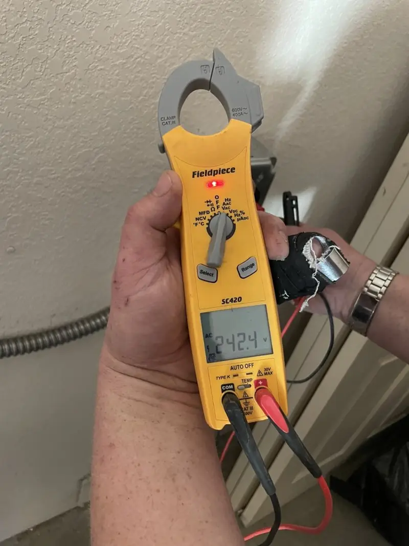 Voltage testing with clamp meter during Ceiling Fan Installation in Ridley Park